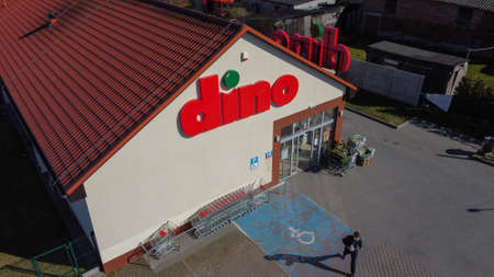 NIECHORZE, REWAL, BALTIC SEA, POLAND - 07/04/2020: DINO supermarket, brand name, brand logo, shopping, chain shopのeditorial素材
