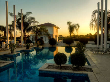 Sunset near the poolの写真素材