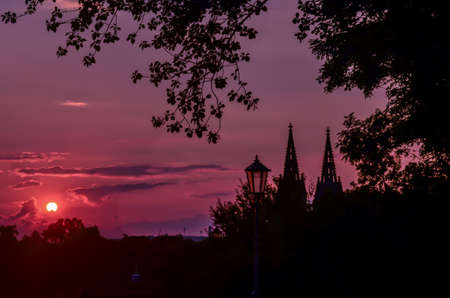 Summer city sunset over Prague in the parkの写真素材