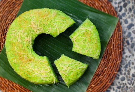 Pandan chiffon cake Traditional Indonesian desert Stone background Top viewの写真素材
