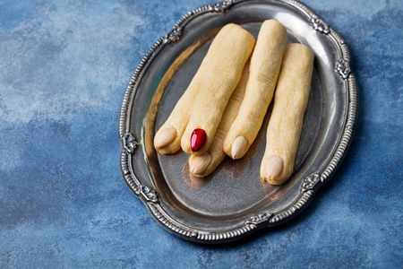 Cookies Witch's fingers for Halloween party celebration. Blue stone background Copy space Top view.の写真素材