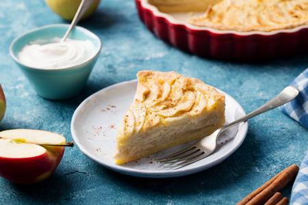 Apple pie on a blue background. Copy spaceの写真素材