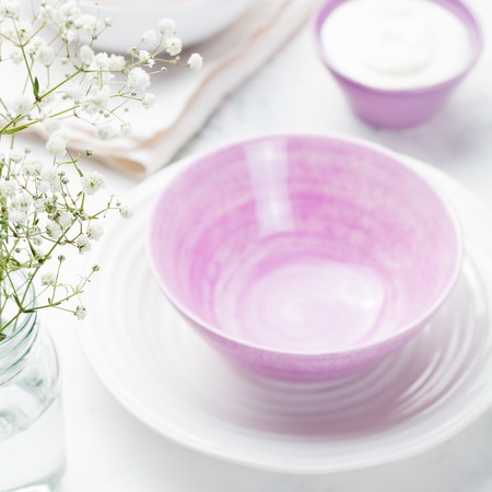 Breakfast setting table blurred background.の写真素材