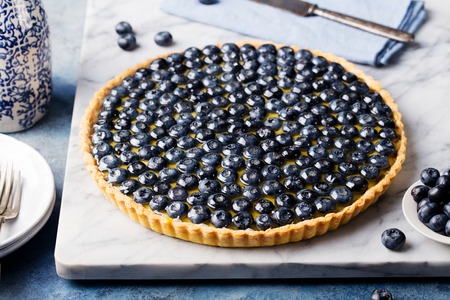 Blueberry tart with vanilla custard Marble boardの写真素材
