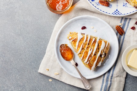 Scones with oats, cranberry and pecan nuts. Top view. Copy space.の写真素材