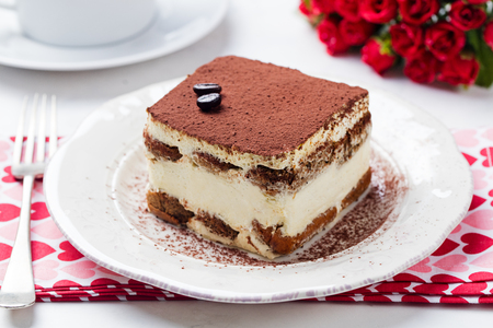 Tiramisu, traditional Italian dessert on a white plate. Close upの写真素材