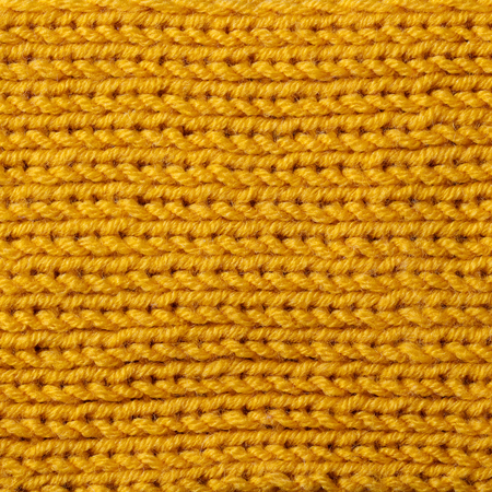 Yellow knitted wool texture  pattern with high resolution.の写真素材