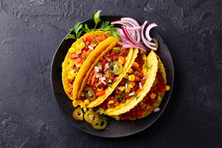 Taco with beef, Mexican traditional cuisine. Dark background. Top view.の写真素材