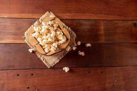 Wooden table with typical Brazilian Festa Junina foods. Popcornの写真素材