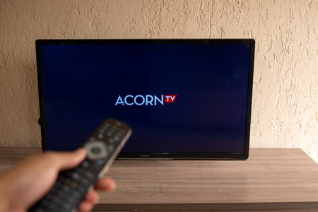 Brazil, Rio de Janeiro - May 19, 2023: In this photo illustration, the Acorn TV logo in the background on the tv.のeditorial素材