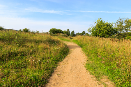 Rural road goes off into the distanceの写真素材