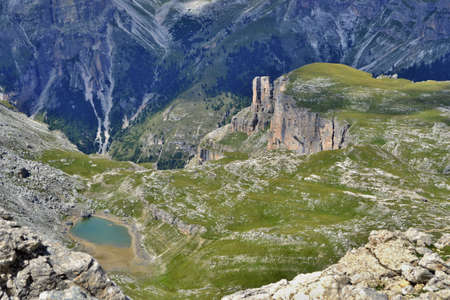 Beautiful view of Dolomites near Sass da Ciampac Sunny day, blue sky, white clouds. Italy.の写真素材