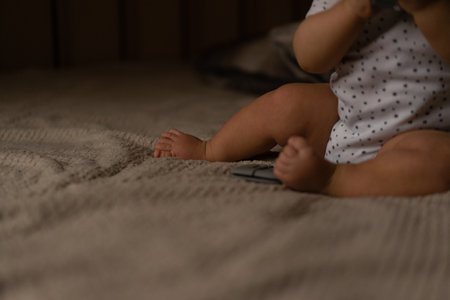 Infant's small legs on blanket. High quality photoの写真素材