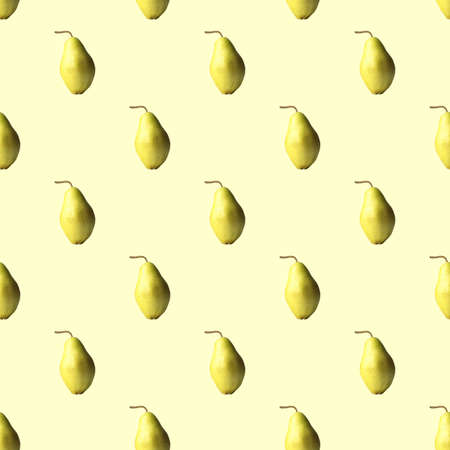 A pattern of ripe, juicy, yellow pears on a light yellow background. Pear Wallpaperの写真素材