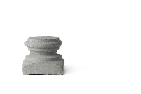 Concrete pedestal of gray color for subject shooting. Concrete figure on a white background. isolate. Space for textの写真素材