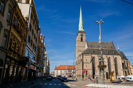 St. Bartholomew's Cathedral on the main Republic square of Plzen, Gothic church in old town in sunny day, Pilsen, Western Bohemia, Czech Republic, August 1, 2020のeditorial素材