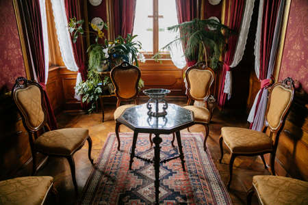 Castle interior. Living room with table and chairs. Milotice castle, South Moravia, Czech Republic, July 06, 2020のeditorial素材