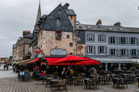 Historic half-timbered buildings at narrow picturesque back street, Honfleur, Normandy, France, September 25, 2019のeditorial素材