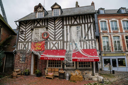 Historic half-timbered buildings at narrow picturesque back street, Honfleur, Normandy, France, September 25, 2019のeditorial素材