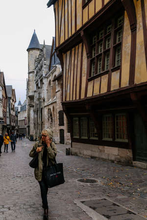 On the streets of the old town of Rouen with traditional half-timbered heritage houses. Rouen, Normandy, France, September 25, 2019のeditorial素材
