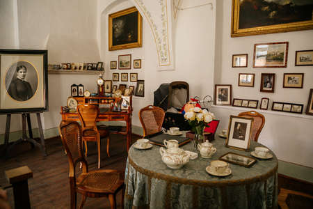 Castle interior. Cabinet with writing desk and old tea set. Castle Grabstejn, Ancient medieval gothic chateau near Chotyne, Liberec Region, Czech Republic, May 08, 2019のeditorial素材