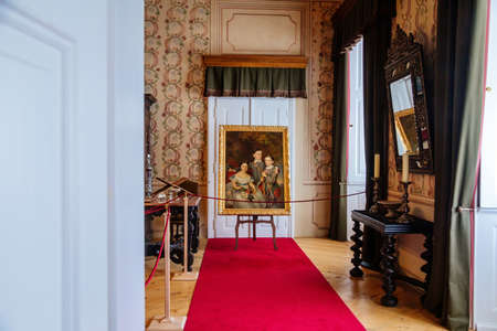 Castle interior. Portrait of children on an easel in a room with Renaissance furniture. Castle Duchcov, Czech Republic, September 19, 2020のeditorial素材