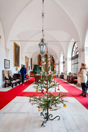 Castle interior decorated for Christmas and New Year. Hall with billiard. Renaissance castle Horsovsky Tyn, Czech Republic, December 31, 2018のeditorial素材