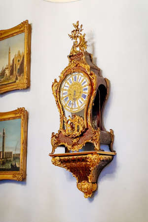 Castle interior. Antique clock. Renaissance castle Horsovsky Tyn, Czech Republic, December 31, 2018