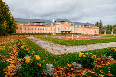 Rococo chateau with a distinguished facade, magnificent residence from the 18th century, Amazing castle garden in the castle Dobris in autumn, Central Bohemia, Czech Republic, October 07, 2017のeditorial素材