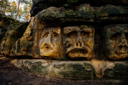 Monument sandstone rock sculptures and Harfenice (Harfenist) cave created by Vaclav Levy between Libechov and Zelizy, Cliff carvings carved in pine forest, Czech republic, November 14, 2020のeditorial素材