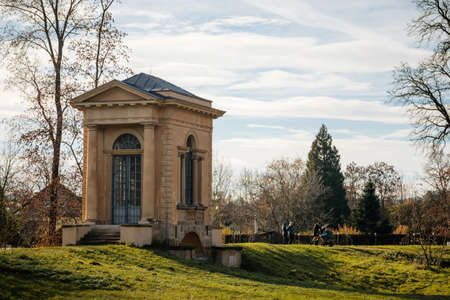 Classicist style Laudon's Pavilion in castle park in sunny autumn day, gazebo in the garden, Veltrusy chateau, Central Bohemia, Czech republic, November 22, 2020のeditorial素材