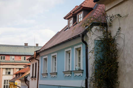 Narrow picturesque street with colorful buildings in old historic center of Kolin, Central Bohemia,...