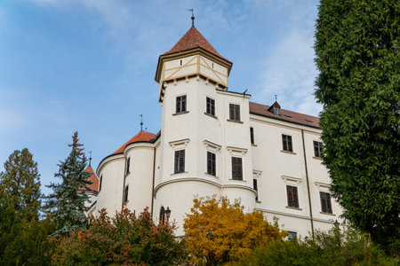 Historic Medieval Konopiste castle residence of Habsburg imperial family, white tower and park of romantic gothic baroque Chateau in autumn sunny day, Central Bohemia, Czech Republic, October 1, 2017のeditorial素材