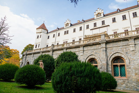 Historic Medieval Konopiste castle residence of Habsburg imperial family, white tower, terrace of romantic gothic baroque Chateau in autumn sunny day, Central Bohemia, Czech Republic, October 1, 2017のeditorial素材