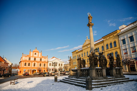 Marian Column, Municipal Library and baroque and renaissance historical buildings at Alsovo Square in winter sunny day, royal medieval town Pisek, Southern Bohemia, Czech Republic, January 09, 2021のeditorial素材