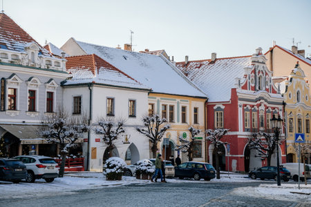 Baroque houses No. 31 and 32 in Jungmannova street, Narrow picturesque street with renaissance historical buildings in winter sunny day, Pisek, Southern Bohemia, Czech Republic, January 09, 2021のeditorial素材
