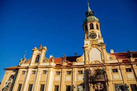 Baroque pilgrim place Loreto Monastery, facade of Prazska Loreta Church of the Nativity of Our Lord,...