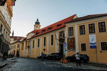 Walnut hospital, narrow picturesque street with baroque and renaissance historical buildings,...