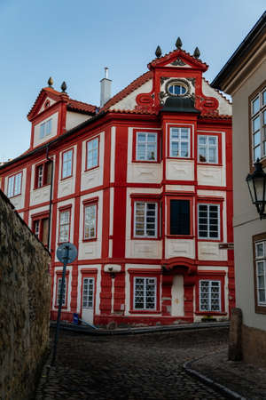 Fascinating narrow picturesque street with baroque and renaissance historical buildings in sunny day, Novy svet, New World in the vicinity of Hradcany, Prague, Czech Republic, December 31, 2020のeditorial素材