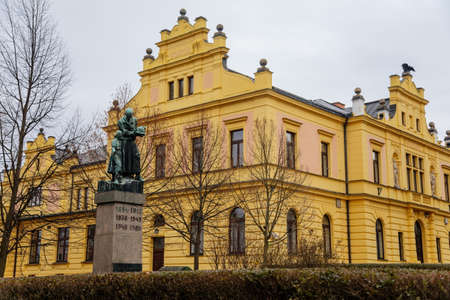 Neo-renaissance historical building of Sokolovna and Monument to victims of wars and communism, cityscape of medieval town in winter day, Bohemian Paradise, Turnov, Czech Republic, January 01, 2021のeditorial素材
