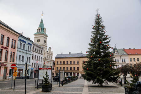 Neo-renaissance town hall, Christmas tree, Square of Bohemian Paradise with baroque and renaissance historical buildings, Information street sign, winter day, Turnov, Czech Republic, January 01, 2021のeditorial素材