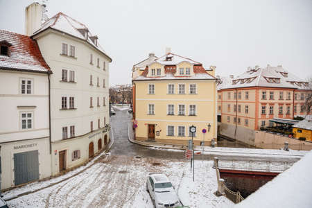 Kampa Island under Charles Bridge and small river Devil, water channel Certovka, Prague Venice under snow in winter day, Mala Strana or Lesser Town district, Prague, Czech Republic, January 12, 2021のeditorial素材