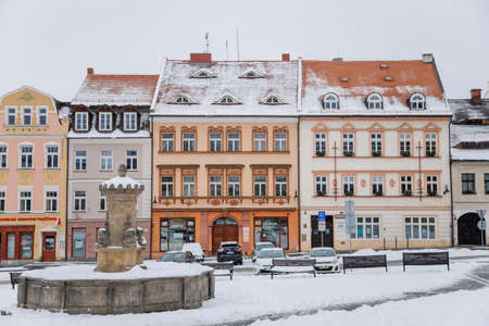 Fascinating picturesque street, baroque, renaissance and Art Nouveau historical buildings on TG Masaryk Square under snow in winter day, Ceska Lipa, North Bohemia, Czech Republic, January 16, 2021のeditorial素材
