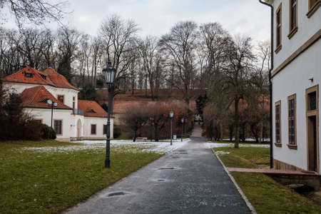 Baroque white benedictine monastery Brevnov with church, Pavilion Vojteska, Garden and park, abbey under snow in winter day, Prague, Czech Republic, January 24, 2021のeditorial素材