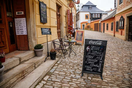 Empty Cafe with sitting outside Concept of No Customers During Coronavirus Outbreak, Medieval street, baroque and renaissance historical buildings, Kutna Hora, Czech Republic, January 23, 2021のeditorial素材