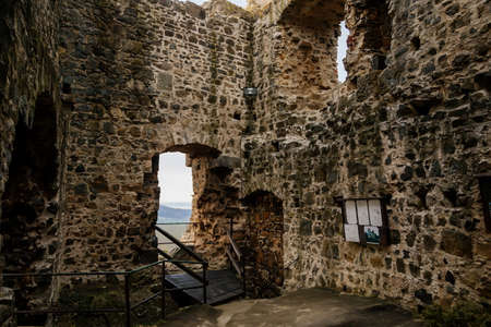 Stone gothic ruins of old rock medieval castle Valecov in sunny winter day before Christmas, ancient fortress on the top of the hill, Bohemian Paradise, Bosen, Czech Republic, December 05, 2020のeditorial素材