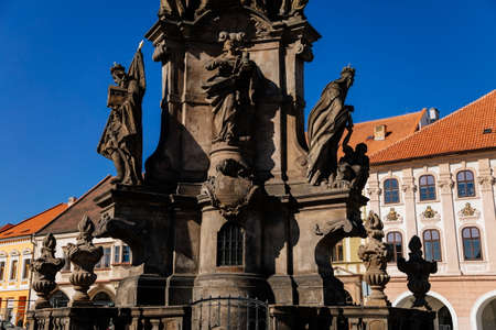 Holy Trinity Column with baroque sculptural group, Main town Peace square, Medieval narrow street,...