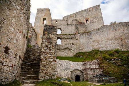 Stone gothic ruins of old medieval castle Rabi in National Park Sumava, ancient fortress in sunny spring day, landmark in countryside, stronghold on the hill, Rabi, Czech Republic, May 29, 2021のeditorial素材