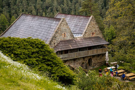 Gothic medieval castle, sunny day, former brewery in lower courtyard, restaurant, masonry wall, old stronghold, Velhartice, National Park Sumava, South Bohemia, Czech Republic, May 29, 2021のeditorial素材
