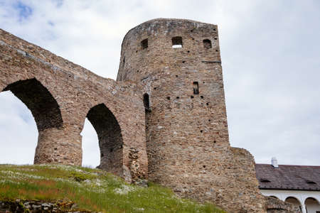 Gothic medieval castle Velhartice in sunny day, tower and stone arch bridge, fortress masonry wall, old stronghold, Velhartice, National Park Sumava, South Bohemia, Czech Republic, May 29, 2021のeditorial素材
